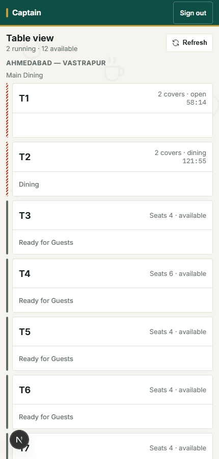 RestroBooth Captain table view on a phone, showing live table states